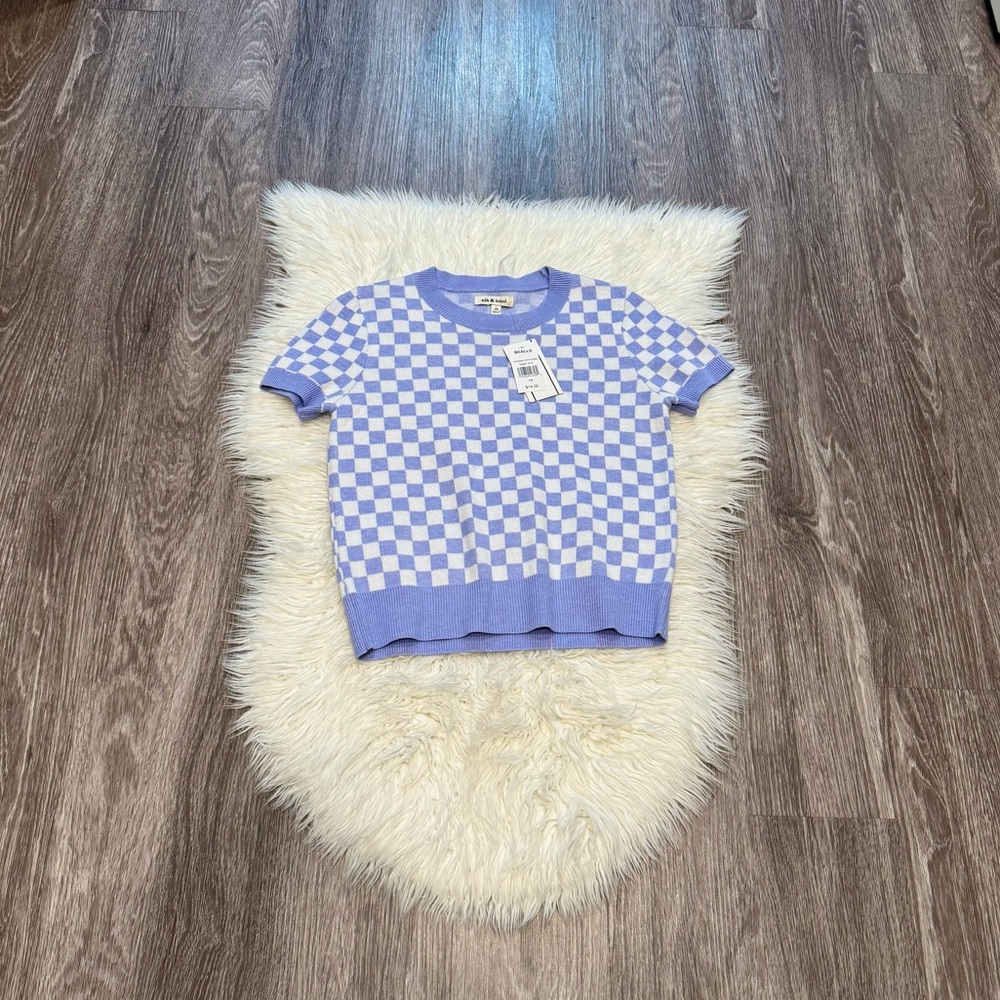 nik & leksi periwinkle & white checkerboard short sleeved sweater from Bealls.